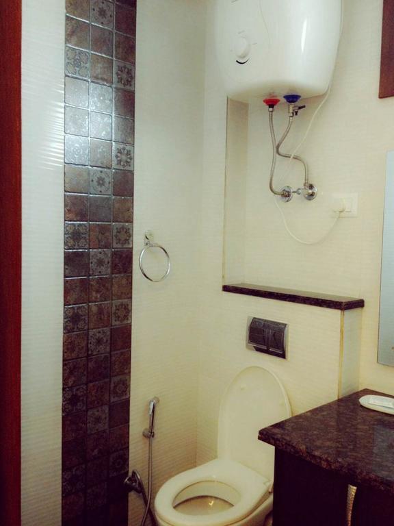 Woodpecker Service Apartments - Green Park Neu-Delhi Zimmer foto